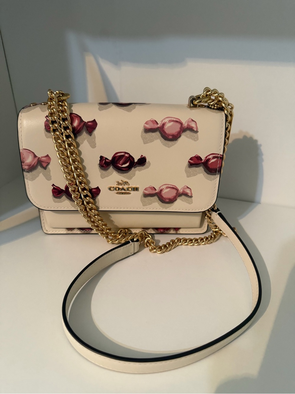 Coach  klare Cream Crossbody Bag with Pink Candy Print and Gold Chain